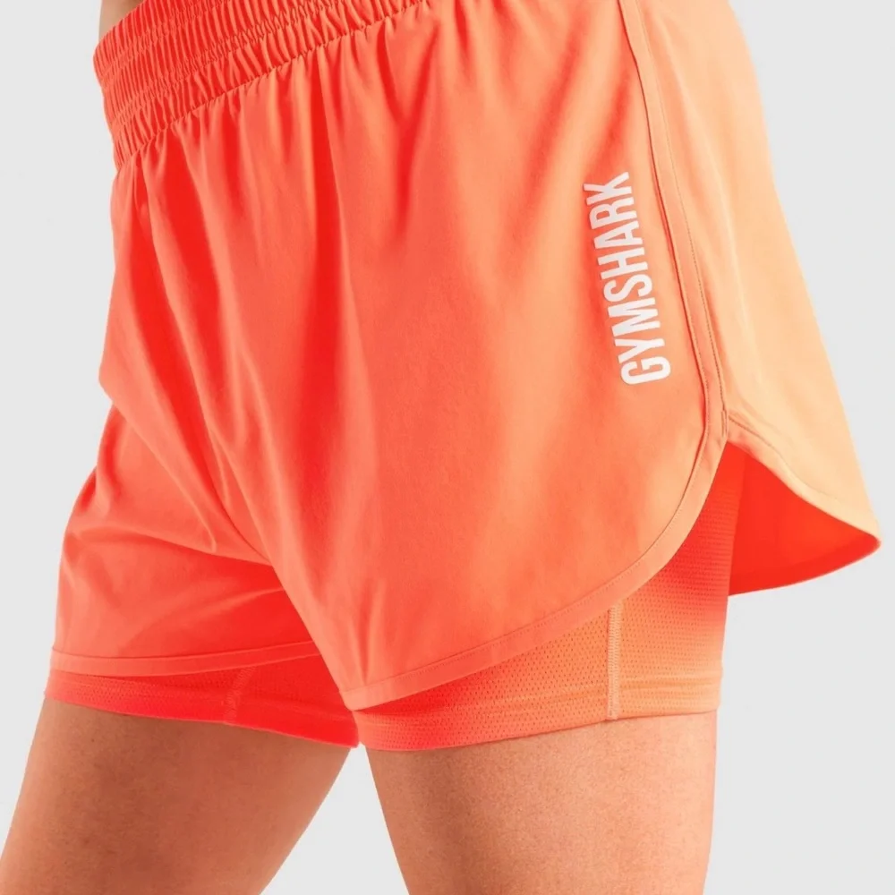 Gymshark Women's Pulse Mid Rise Shorts - in Coral - Picture 1 of 7